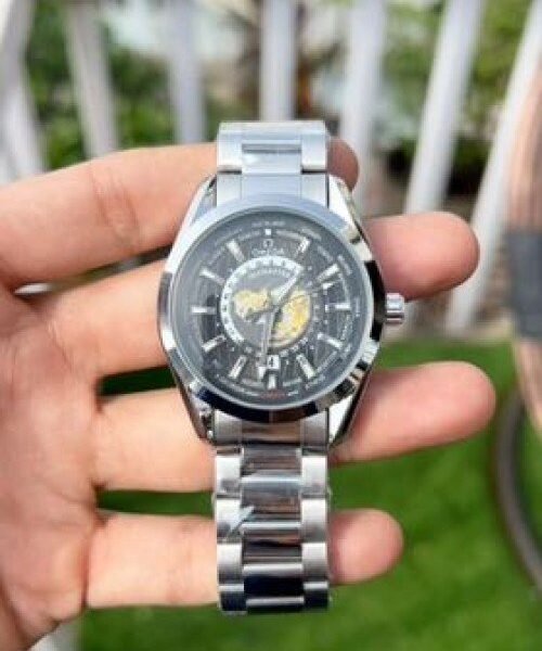 Alternative view of OMEGA SEAMASTER WORLDTIMER shift movement back open